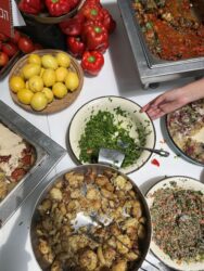 a picture of a table with all kind of  vegetarian food